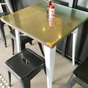 Glass added to a Tolix Table by a VIC Cafe