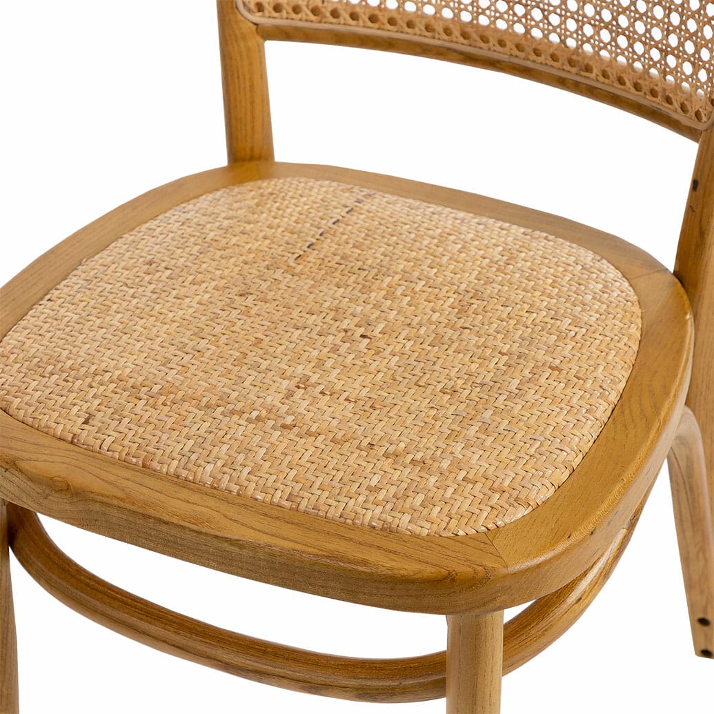 wooden chair with plastic cane